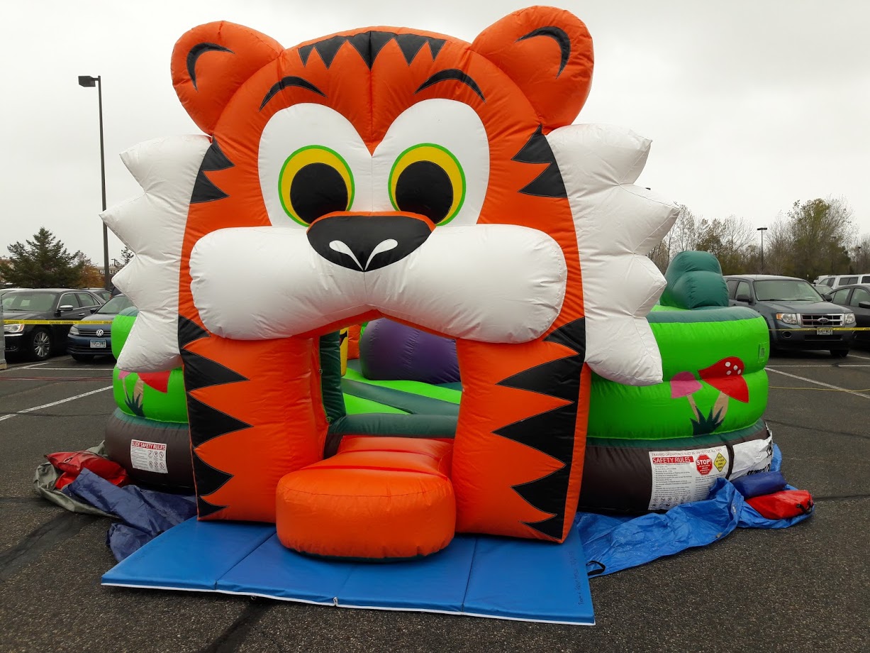 Toddler combo inflatable setup in parking lot and safely secured